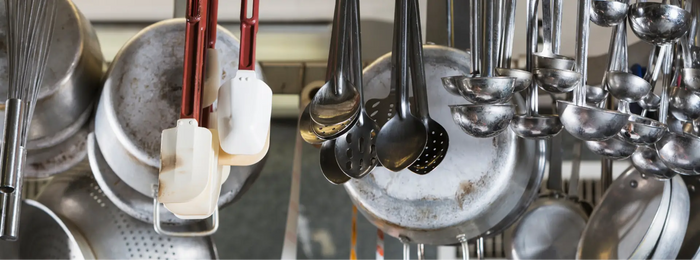 Pots, pans, ladles, and other school kitchen equipment
