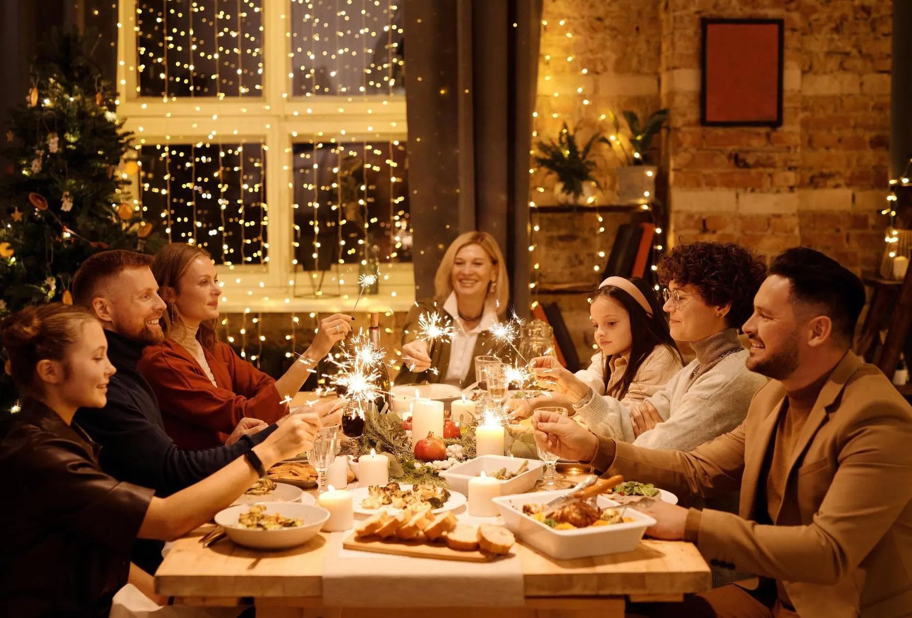 A family enjoying a Christmas dinner.