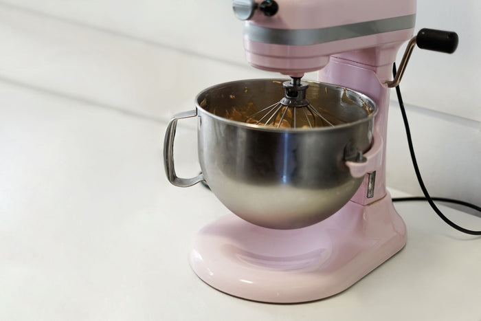 A pink stand mixer 