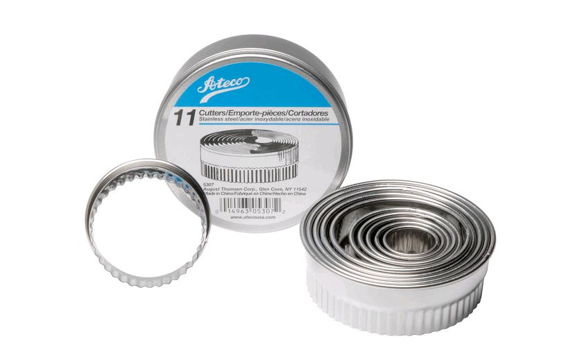 11 piece stainless cutter set against white background