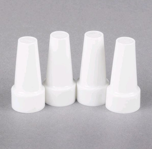 White plastic tube covers against grey background