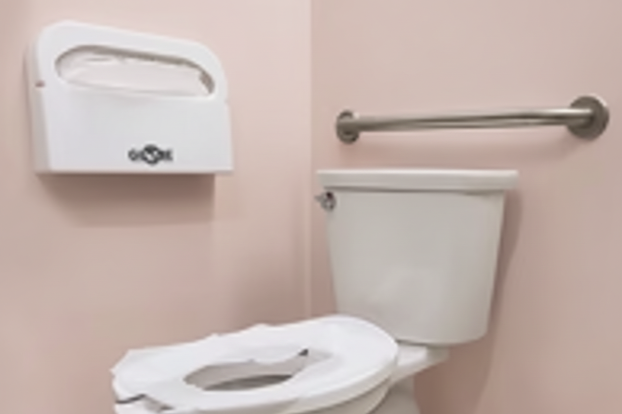 Toilet Seat Cover Dispenser 4600 empty on white background
