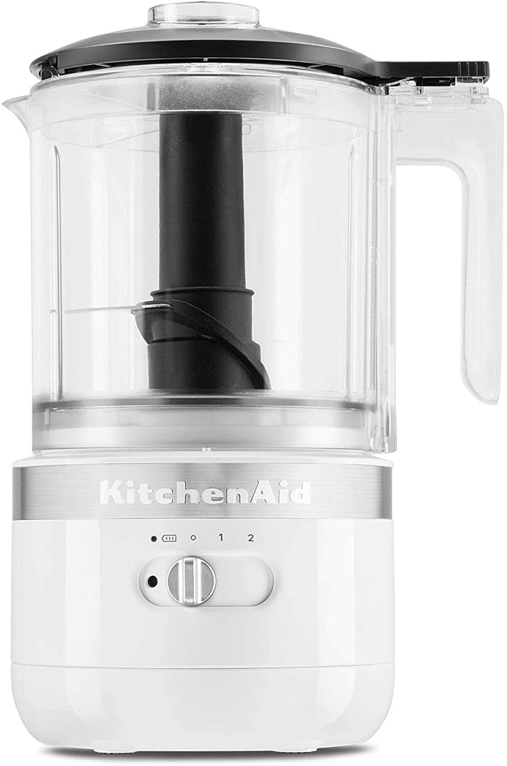 KitchenAid 5 Cup Cordless Food Chopper in shade Black on table surrounded by food