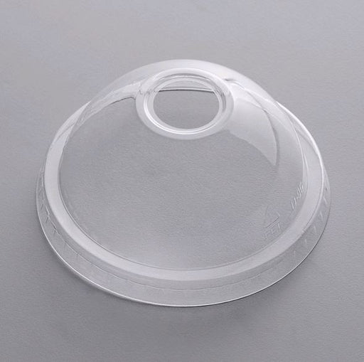 Clear Dome Lid 12-24oz. with 1" Hole CUPLCDH1624 on grey table