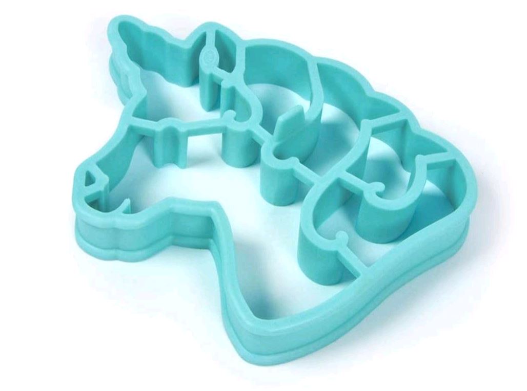 Blue silicone unicorn mold on white background