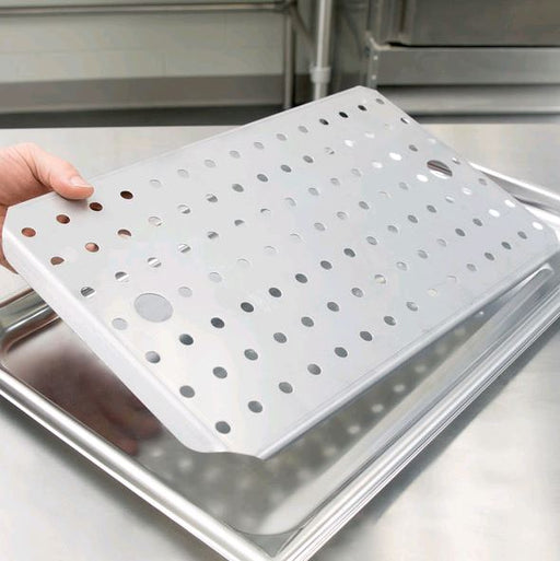Vollrath 20000 Super Pan V Full Size Stainless Steel Steam Table Pan False Bottom being held above pan