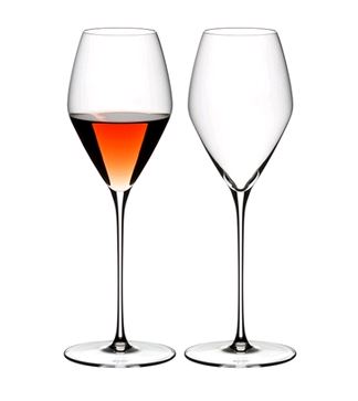 RIEDEL 6330/55 Veloce Rosé - 2 Pack on white background with one glass with rose